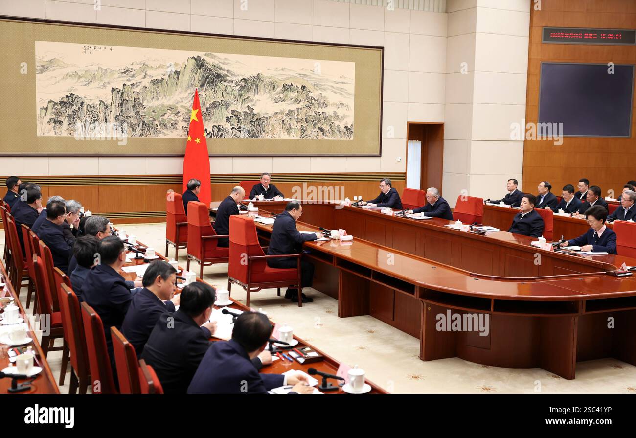 Beijing, China. 5th Feb, 2025. Chinese Premier Li Qiang presides over a plenary meeting of the State Council convened to discuss a draft government work report on Feb. 5, 2025. The document will be deliberated at the top legislature's annual session in March. Credit: Huang Jingwen/Xinhua/Alamy Live News Stock Photo