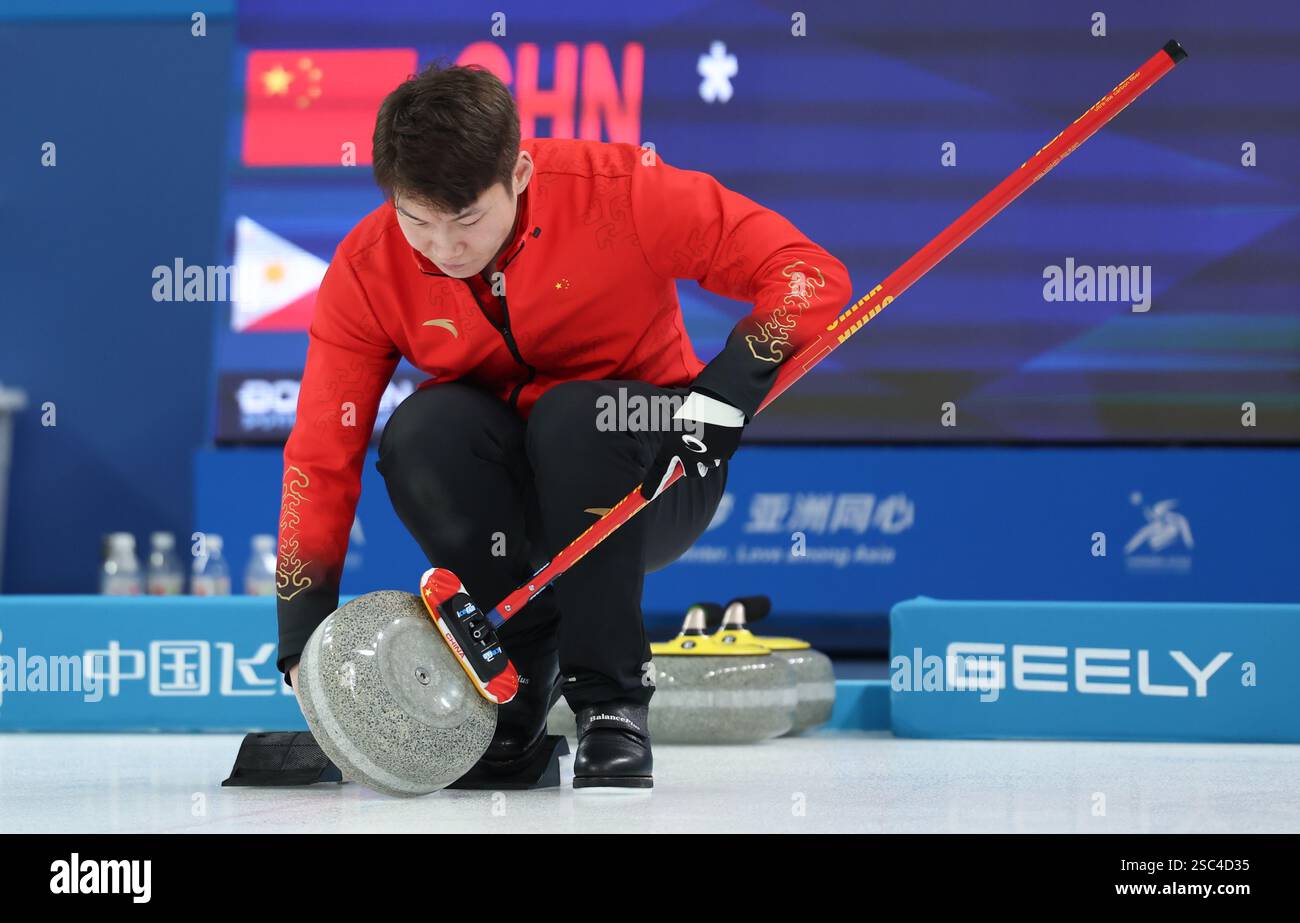 Harbin, China's Heilongjiang Province. 5th Feb, 2025. Wang Zhiyu wipes ...