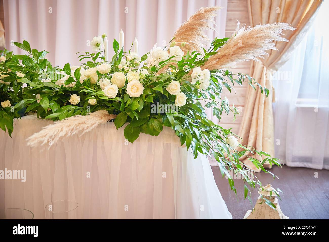Wedding table setting in rustic style. decorated flowers Stock Photo