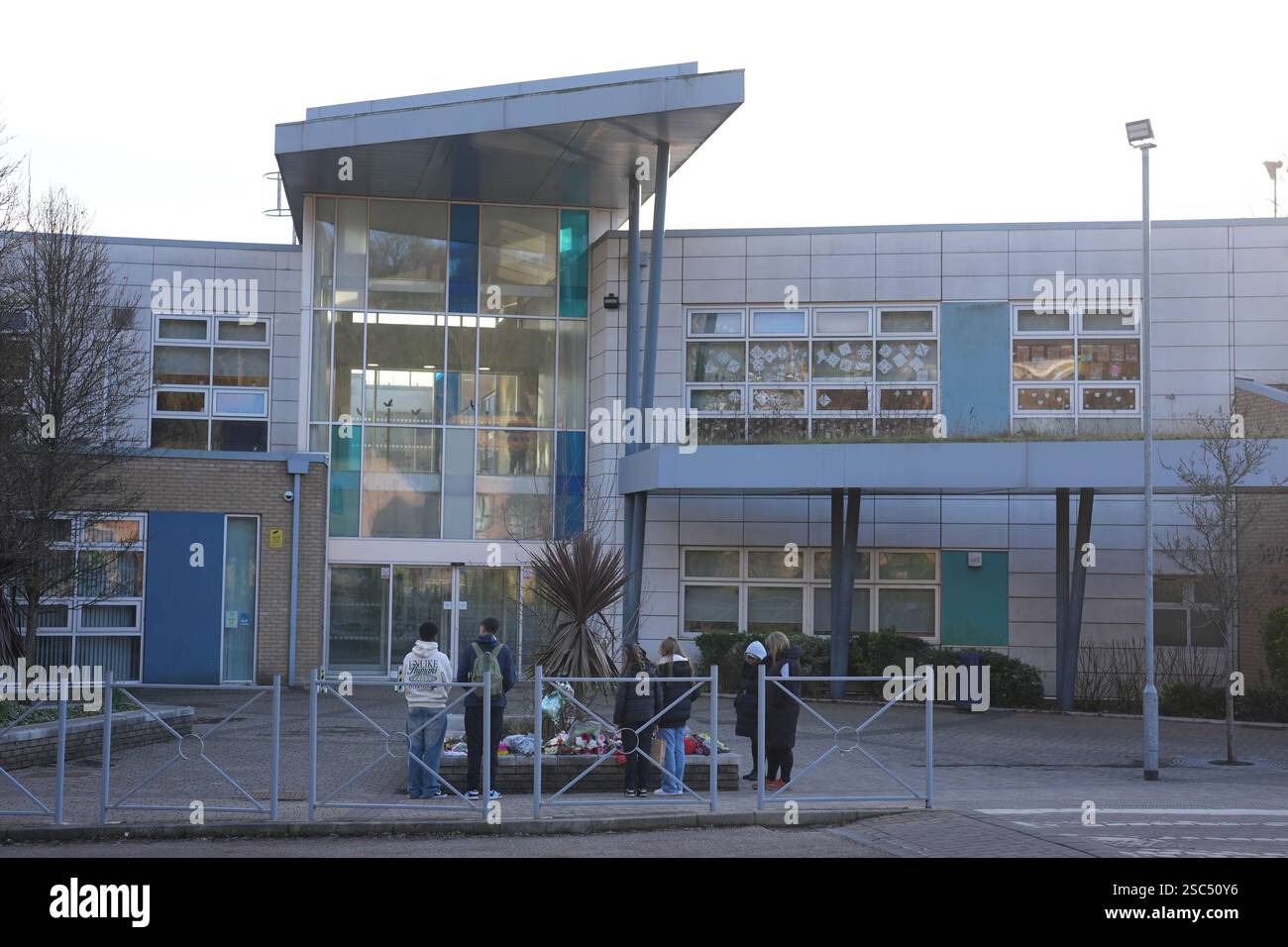 Floral tributes outside All Saints Catholic High School, on Granville