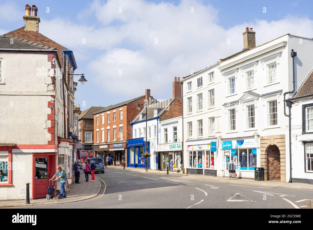Horncastle village centre with people shopping on the High street in  Horncastle Lincolnshire England UK GB Europe Stock Photo