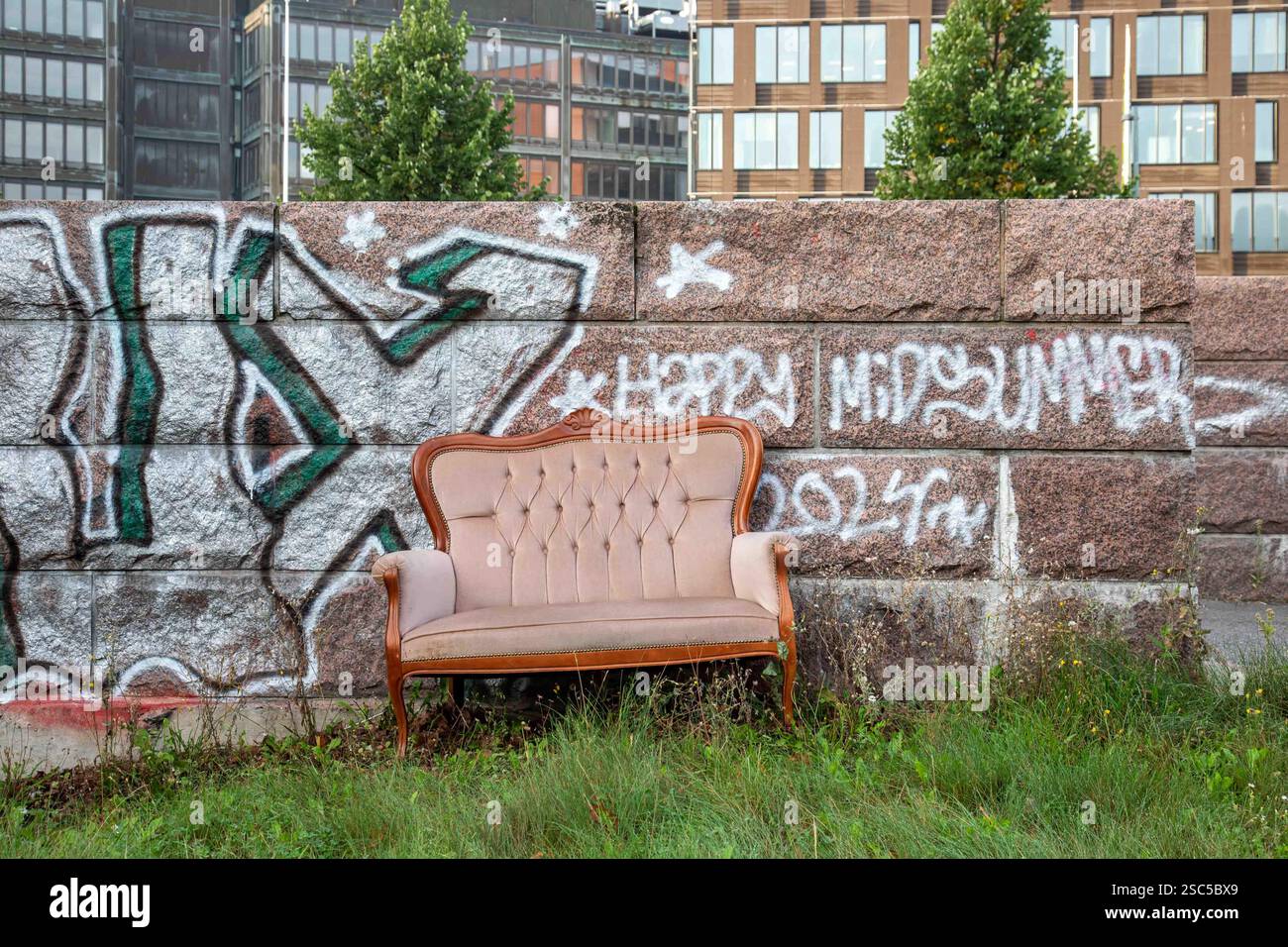 Abandoned sofa in Vallila district of Helsinki, Finland Stock Photo