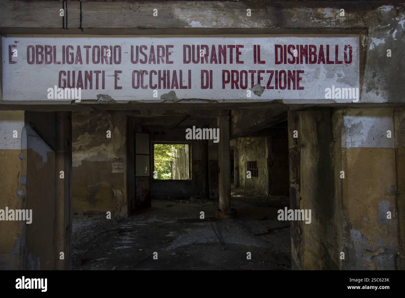 A danger sign in an abandoned factory Stock Photo - Alamy