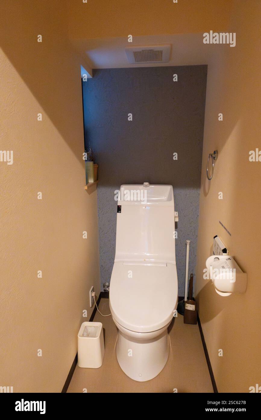 Modern Japanese toilet design in compact bathroom setting showcasing ...