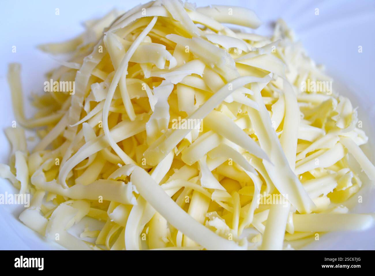 Grated cheese plate hi-res stock photography and images - Alamy