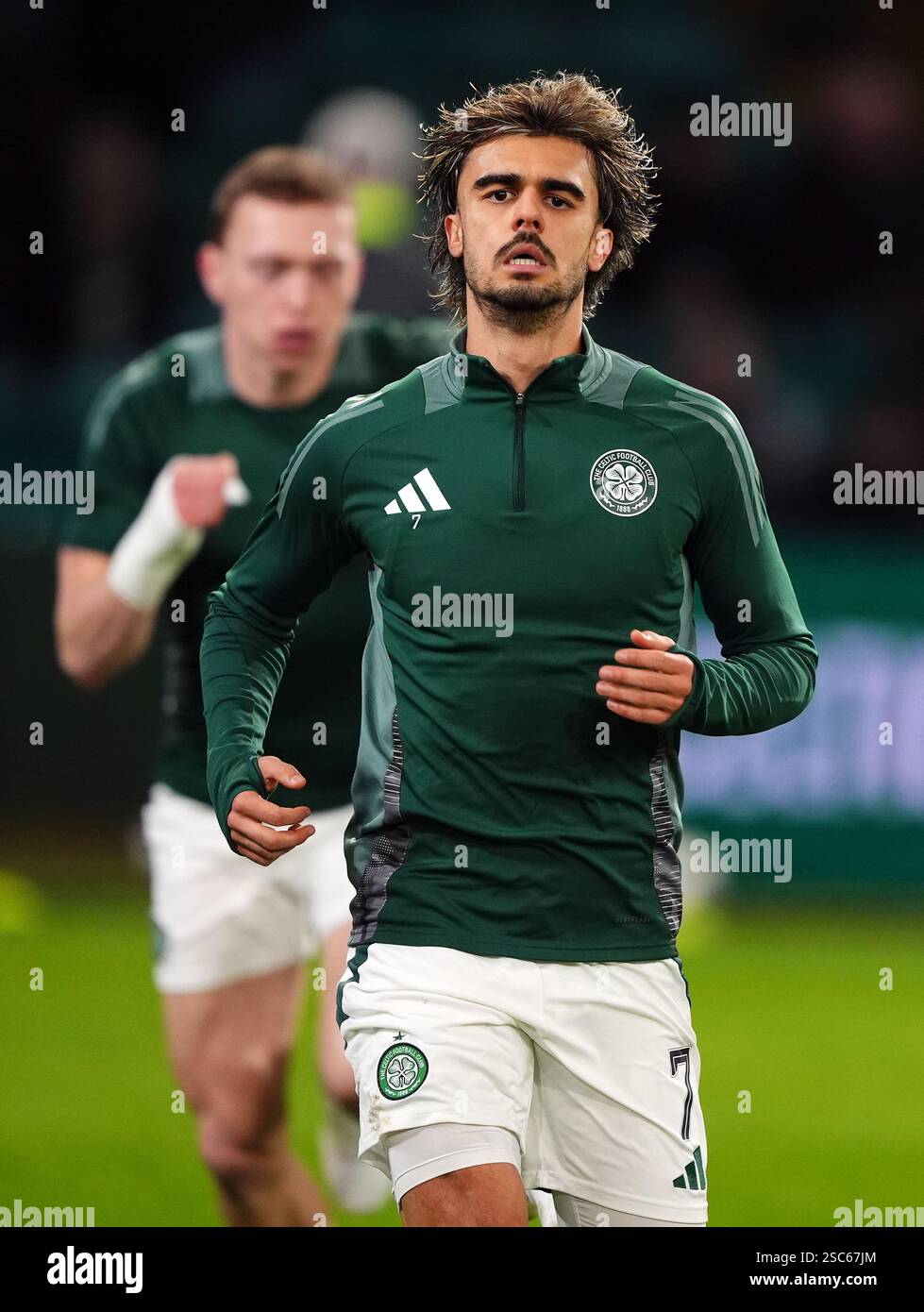 Celtic's Jota warms up before the William Hill Premiership match at ...