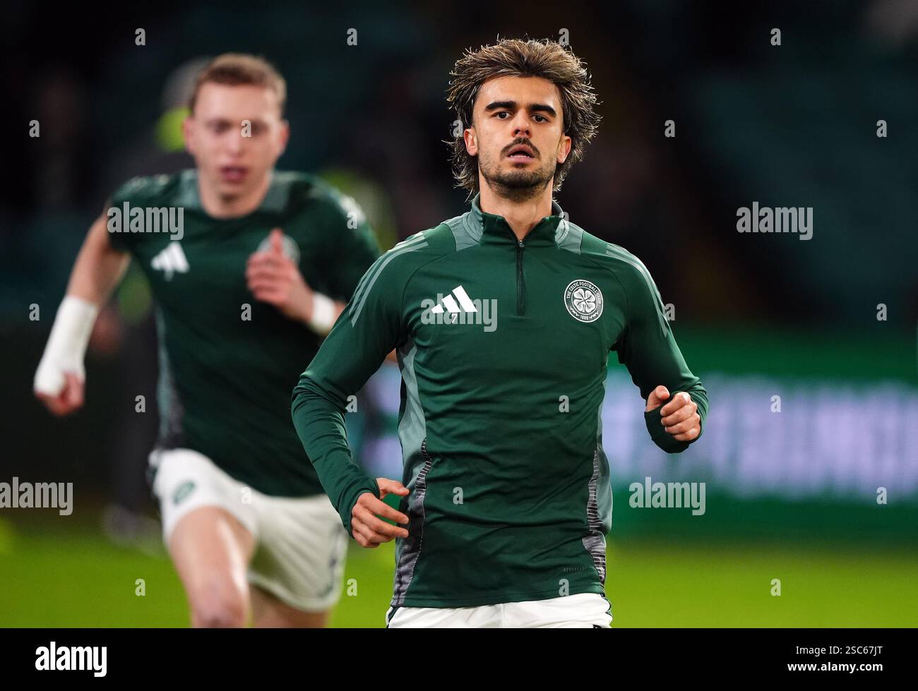 Celtic's Jota warms up before the William Hill Premiership match at ...