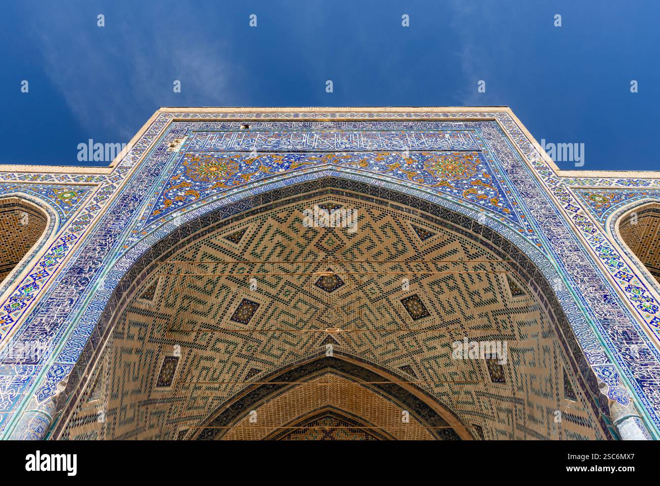 Inner portal of Ulugh Beg Madrasah, corner of inner courtyard. Registan square, Samarkand, Uzbekistan Stock Photo