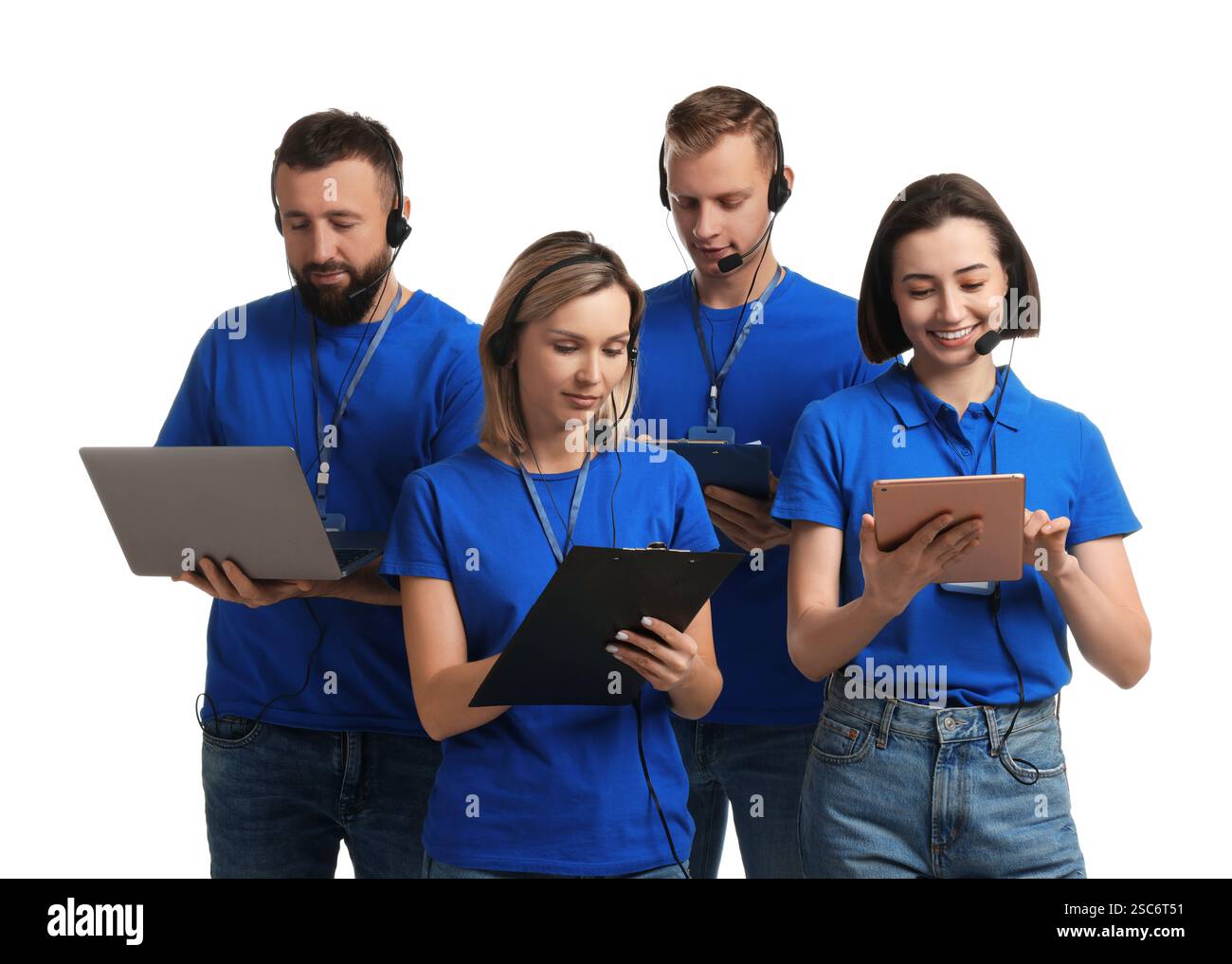 Technical support call center. Team of friendly operators working on ...