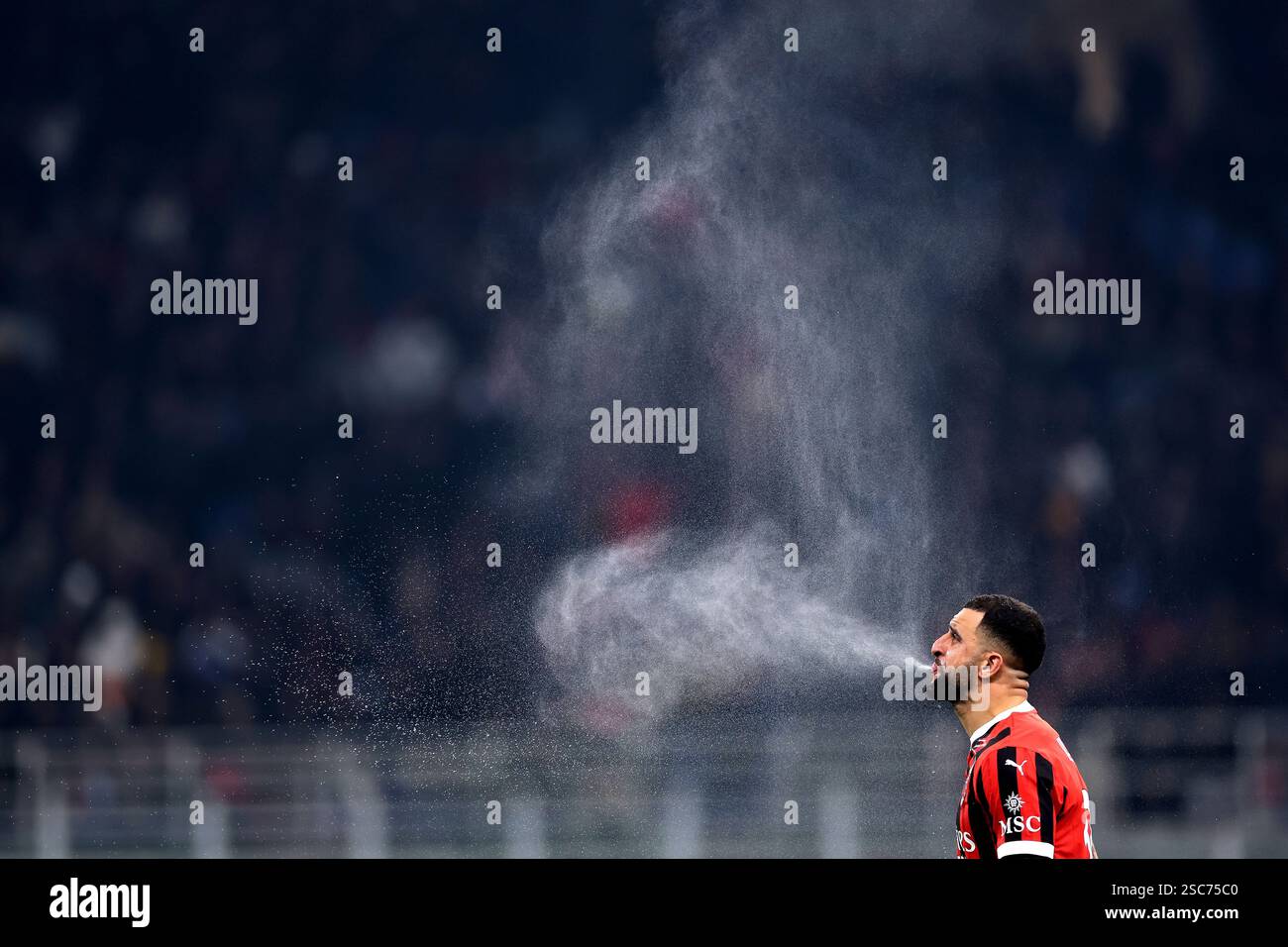 Milan, Italy. 5th Feb, 2025. Kyle Walker of AC Milan spits water prior