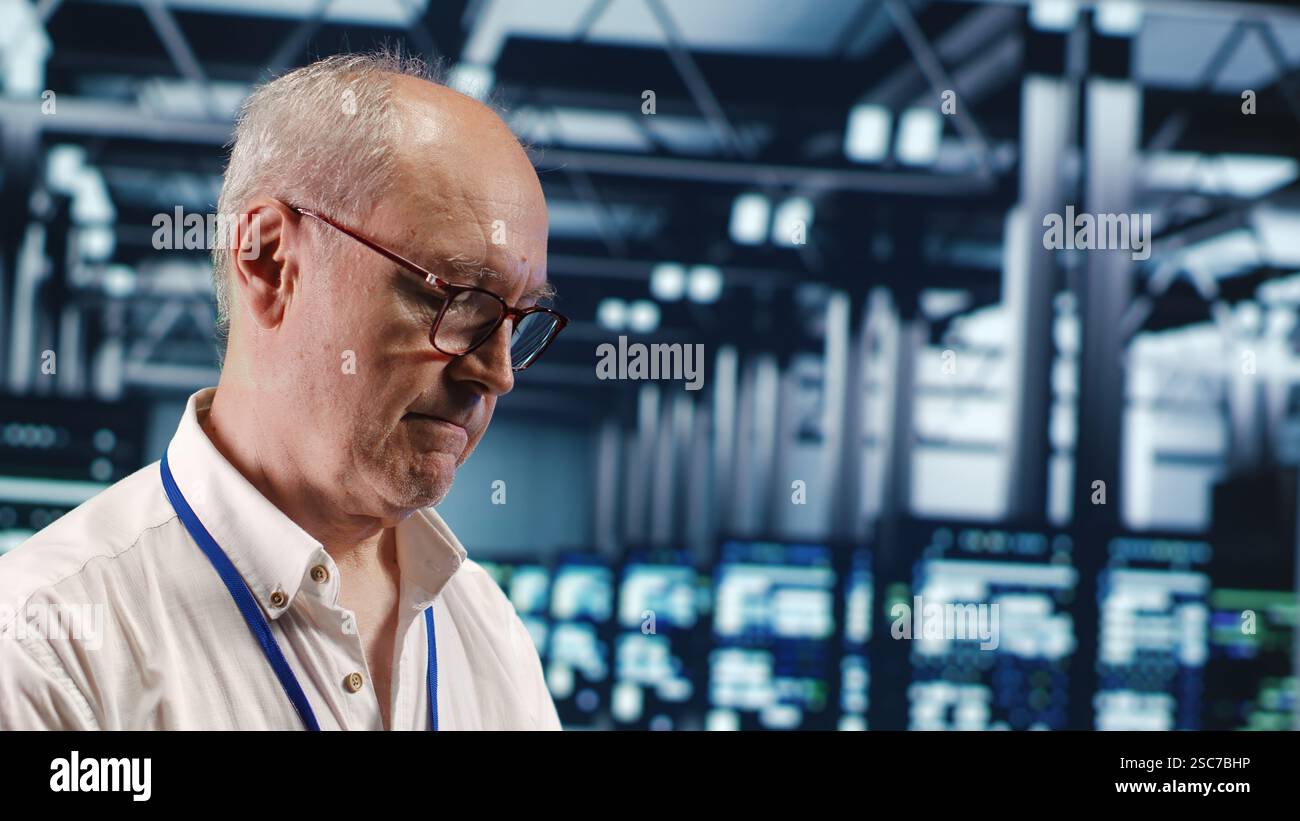 Competent professional in data center, solving tasks on tablet while running scripts on laptop terminal. Skillful developer amidst servers, accessing databases and manipulating lines of code, close up Stock Photo