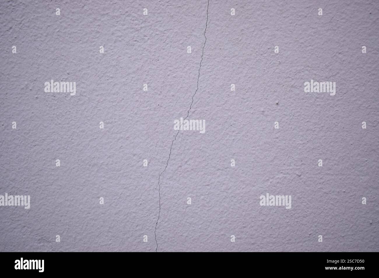 Cracked white wall background. Stock Photo
