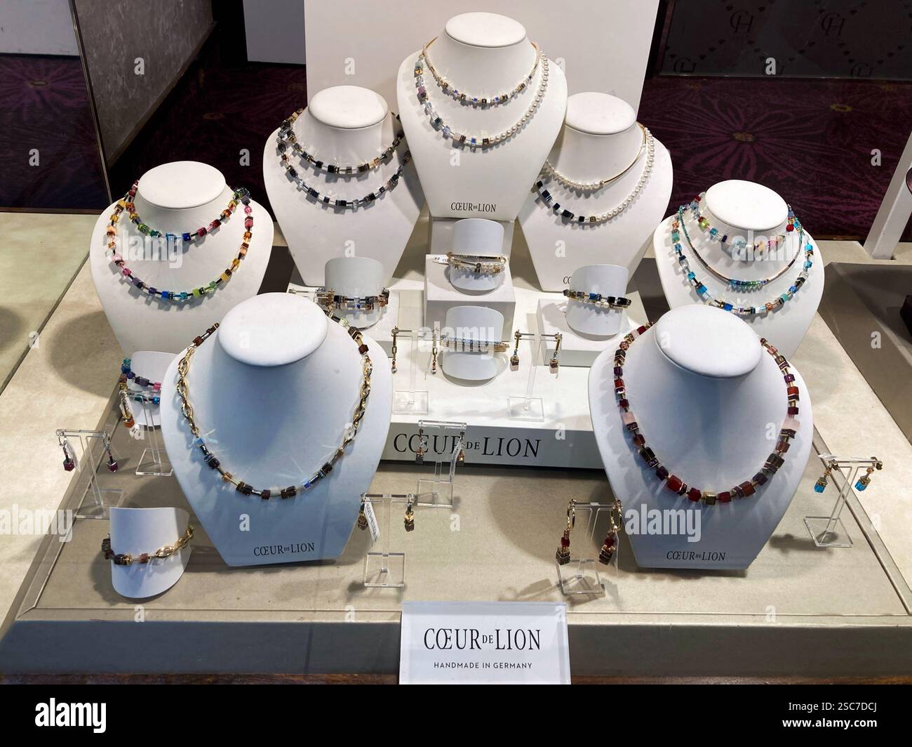 Jewellers shop window with gold and silver Coeur de Lion items for sale - Smartphone Captured Stock Image Jewellers shop window with gold and silver Coeur de Lion items for sale - Smartphone Captured Stock Image