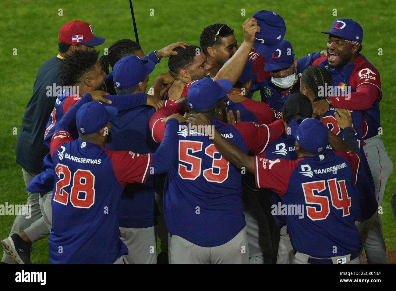 Dominican Republic players celebrate after a Caribbean Series baseball