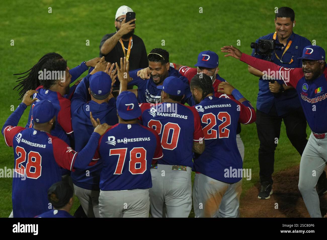 Dominican Republic players celebrate after a Caribbean Series baseball