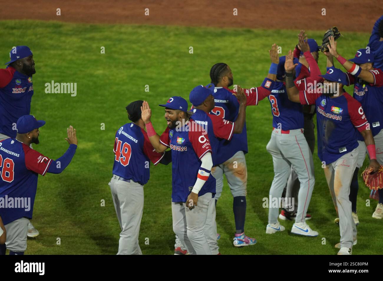 Dominican Republic players celebrate after a Caribbean Series baseball