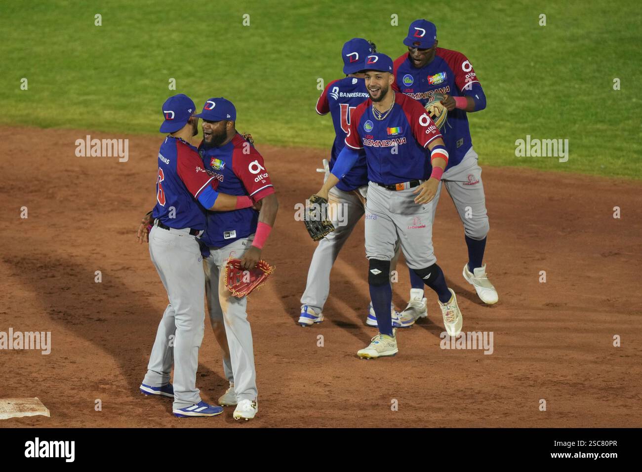 Dominican Republic players celebrate after a Caribbean Series baseball