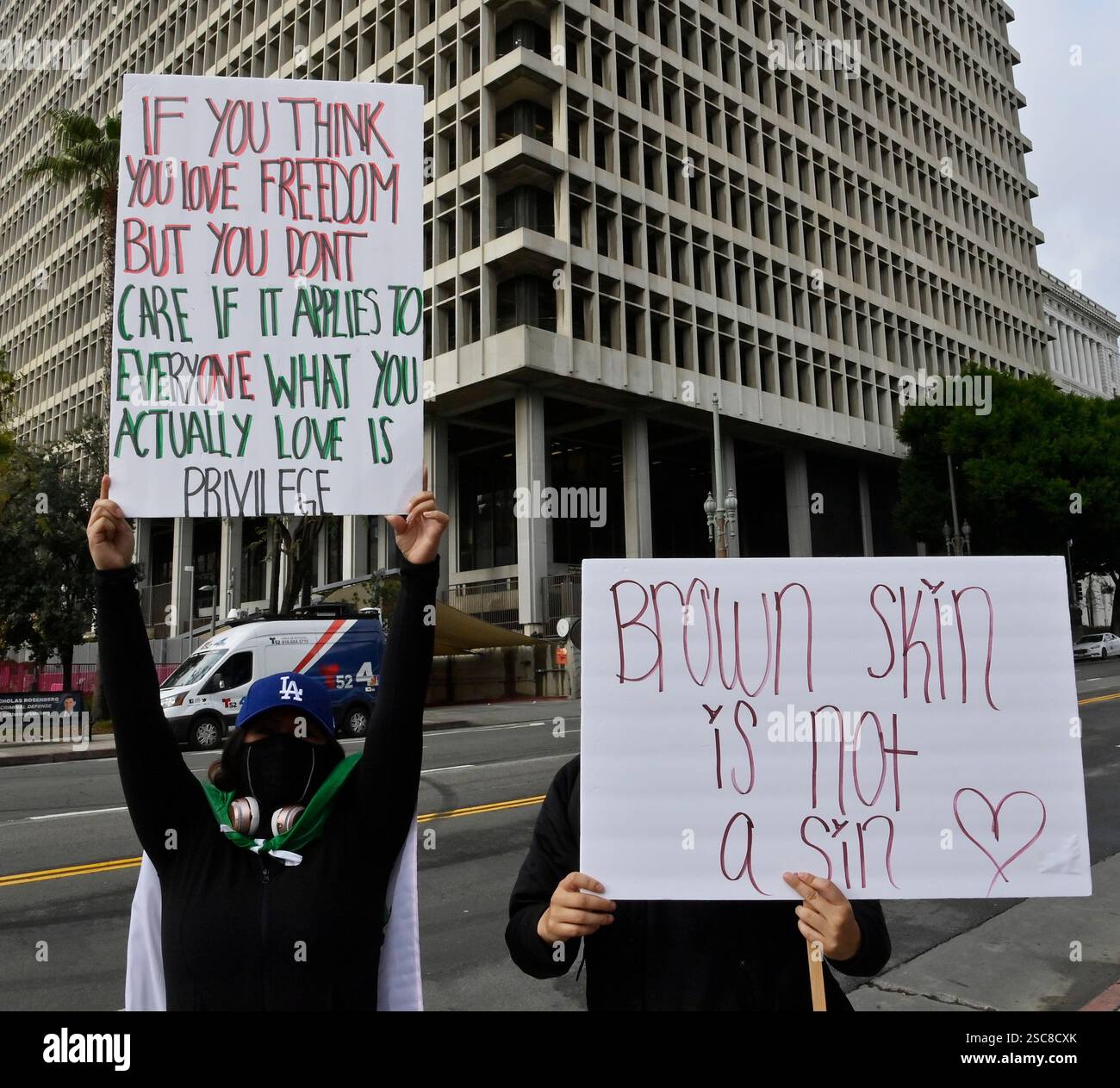 Hundreds protest the Trump administrations aggressive moves to reshape ...