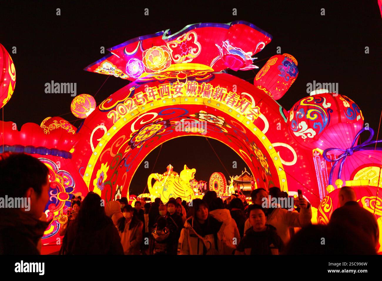 People visit the Xi'an City Wall Lantern Festival in Xi'an City ...