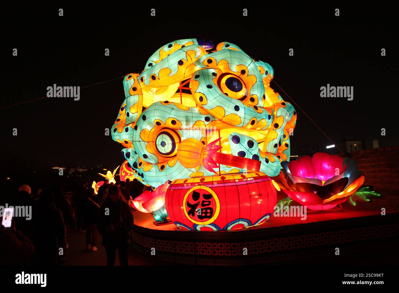 People visit the Xi'an City Wall Lantern Festival in Xi'an City ...