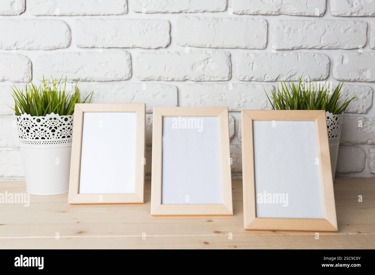 blank black picture frame on the wall Stock Photo - Alamy