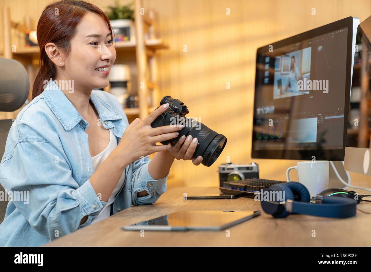 Photographer working in a studio Stock Photo