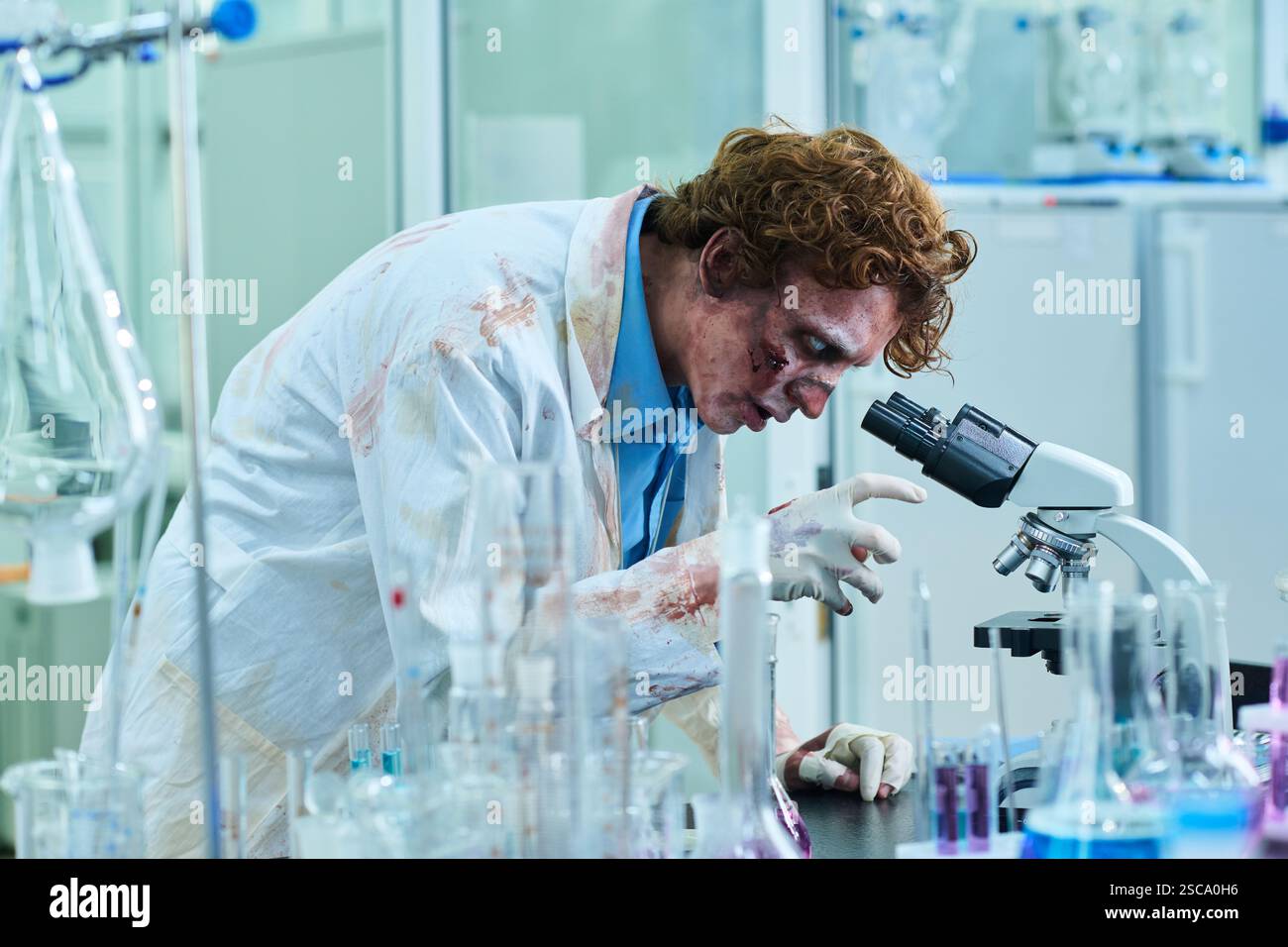 Zombie Man Working In Modern Lab Stock Photo