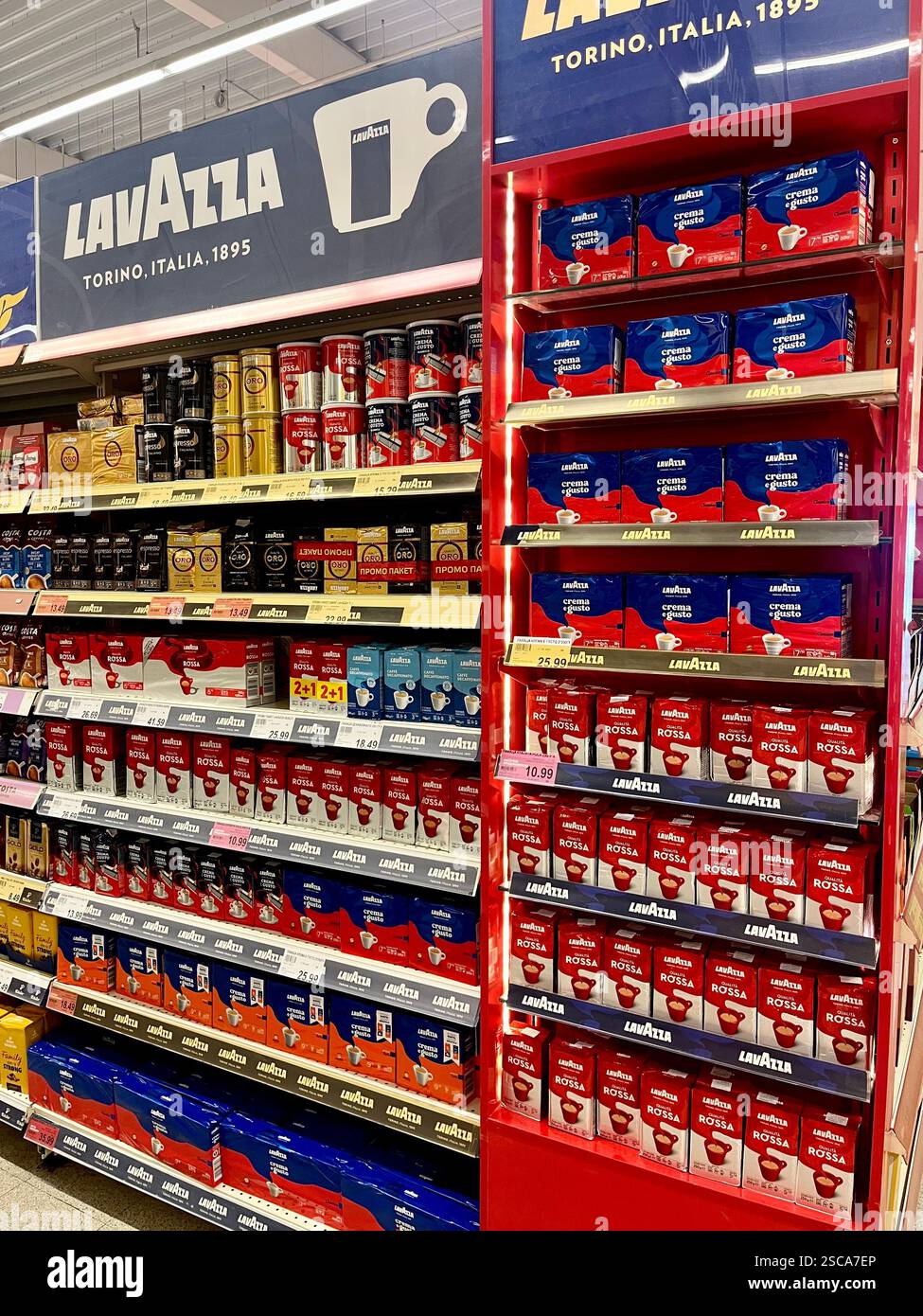 Lavazza coffee, packs of coffee, shopping, consumerism, shop interior, supermarket interior, Lavazza supermarket shelf, Lavazza coffee display - Smartphone Captured Stock Image