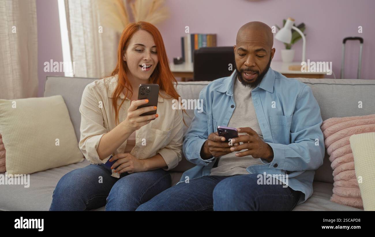 Photo inspiration: Gallery Detail: Interracial Couple Sitting Together In A Living Room Using Smartphones