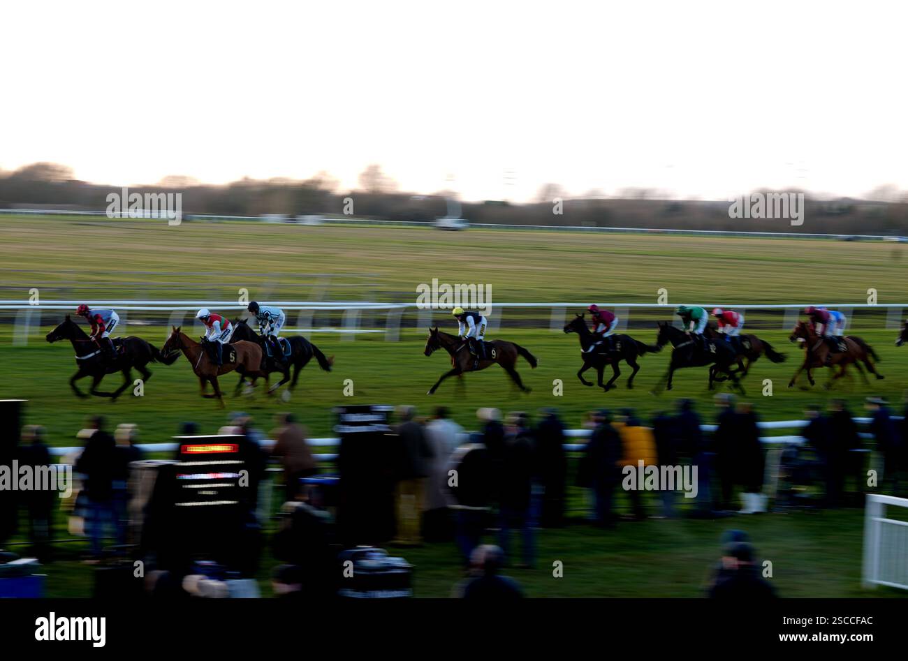Huntingdon Races Spectacularsunrise ridden by Jamie Brace (centre) on their way to ...