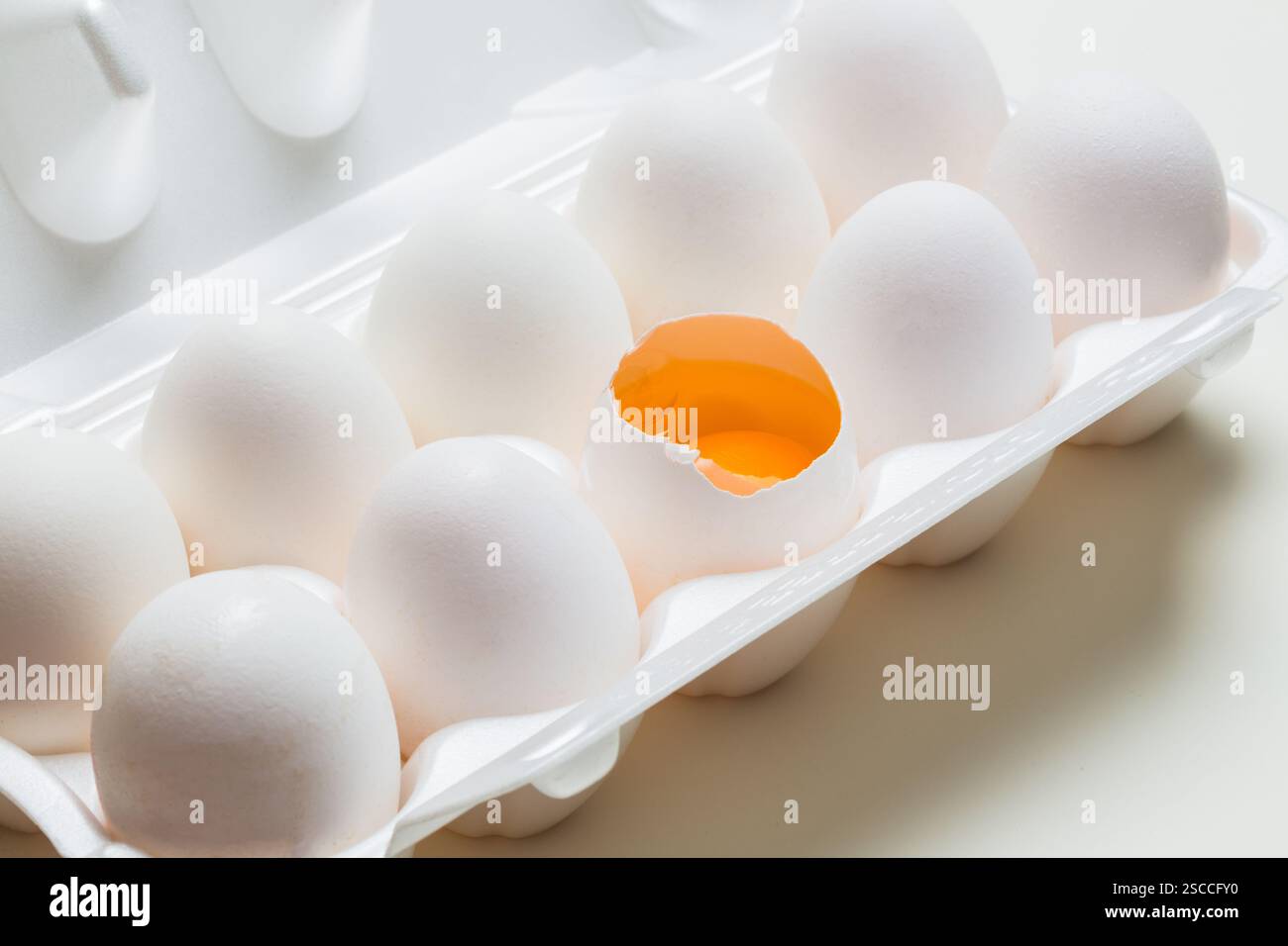 Chicken eggs in the cassette box on a white background Stock Photo - Alamy