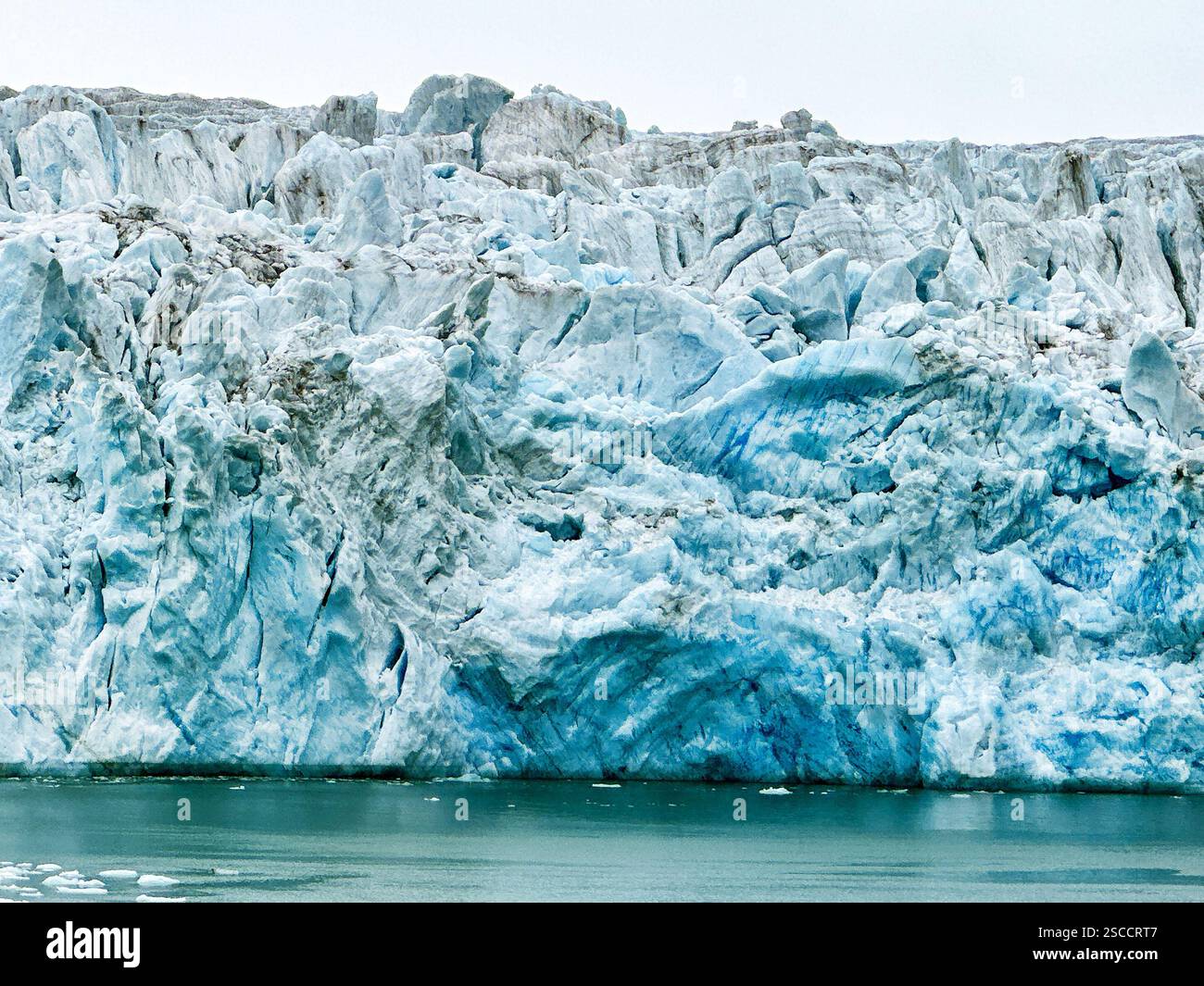 Large glacier meets the waters of a fjord in Prince Christian Sound in Greenland - Smartphone Captured Stock Image