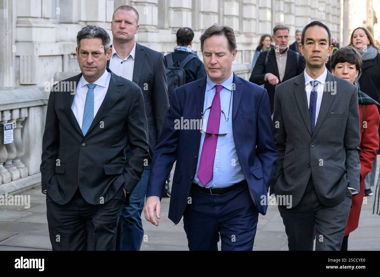 Joel Kaplan (president of global affairs of Meta) Nick Clegg, Chris Yiu (director of public policy at Meta) and Bailey Ingram in Whitehall, 05.02.2025 Stock Photo
