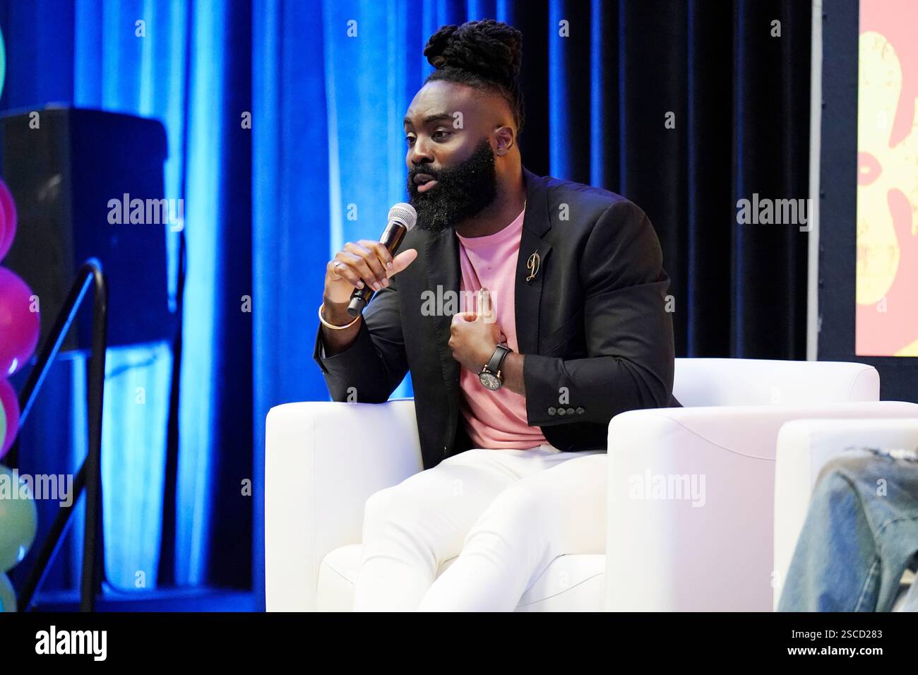 New Orleans Saints linebacker Demario Davis speaks on stage at the