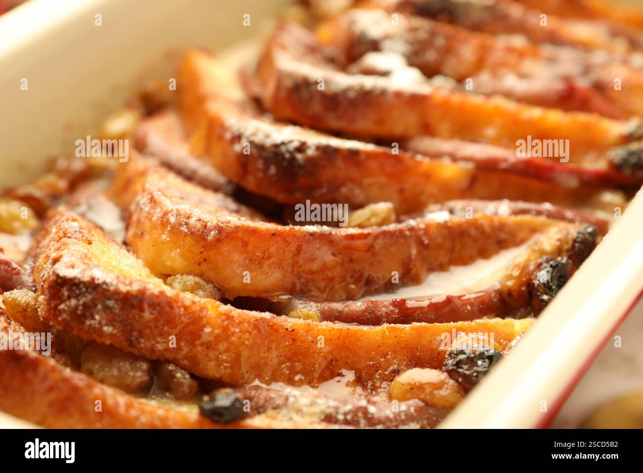 Freshly baked bread pudding in baking dish, closeup Stock Photo
