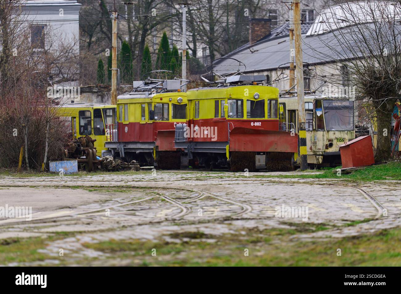 Lviv, Ukraine – 24.03.2024: Two yellow-red track cleaning trams on the ...