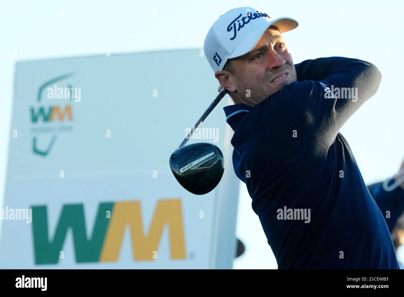 Justin Thomas hits his tee shot at the 10th hole during the first round