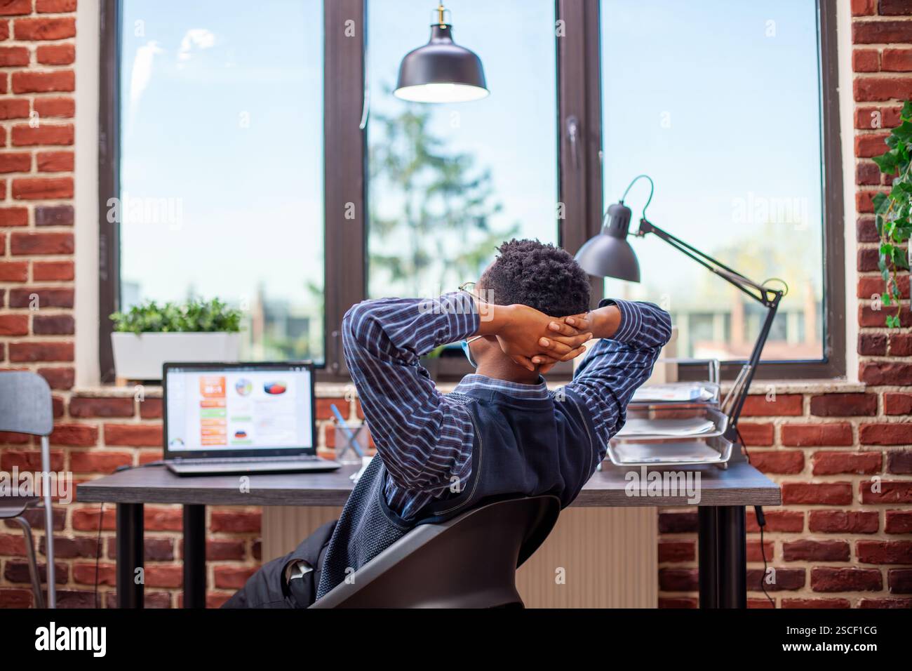 Man relaxing after completing hi-res stock photography and images - Alamy