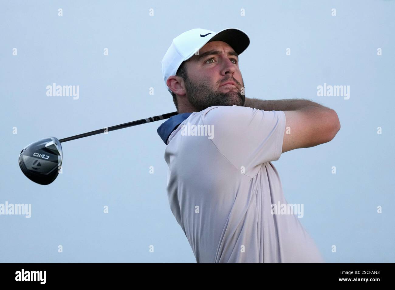 Scottie Scheffler hits his tee shot at the 16th hole during the first
