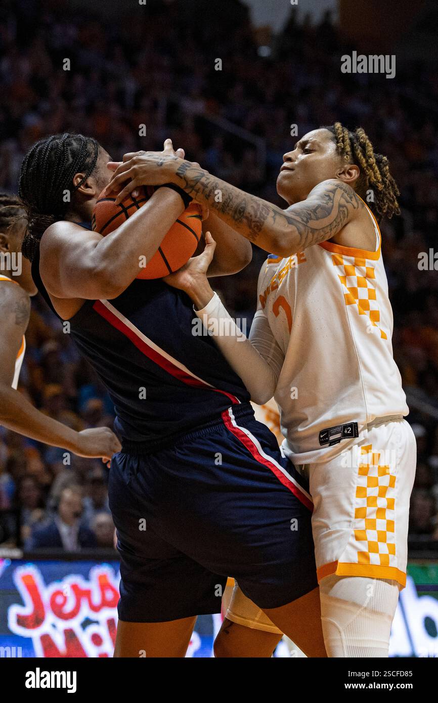 Tennessee guard Ruby Whitehorn (2) battles for the ball with UConn ...