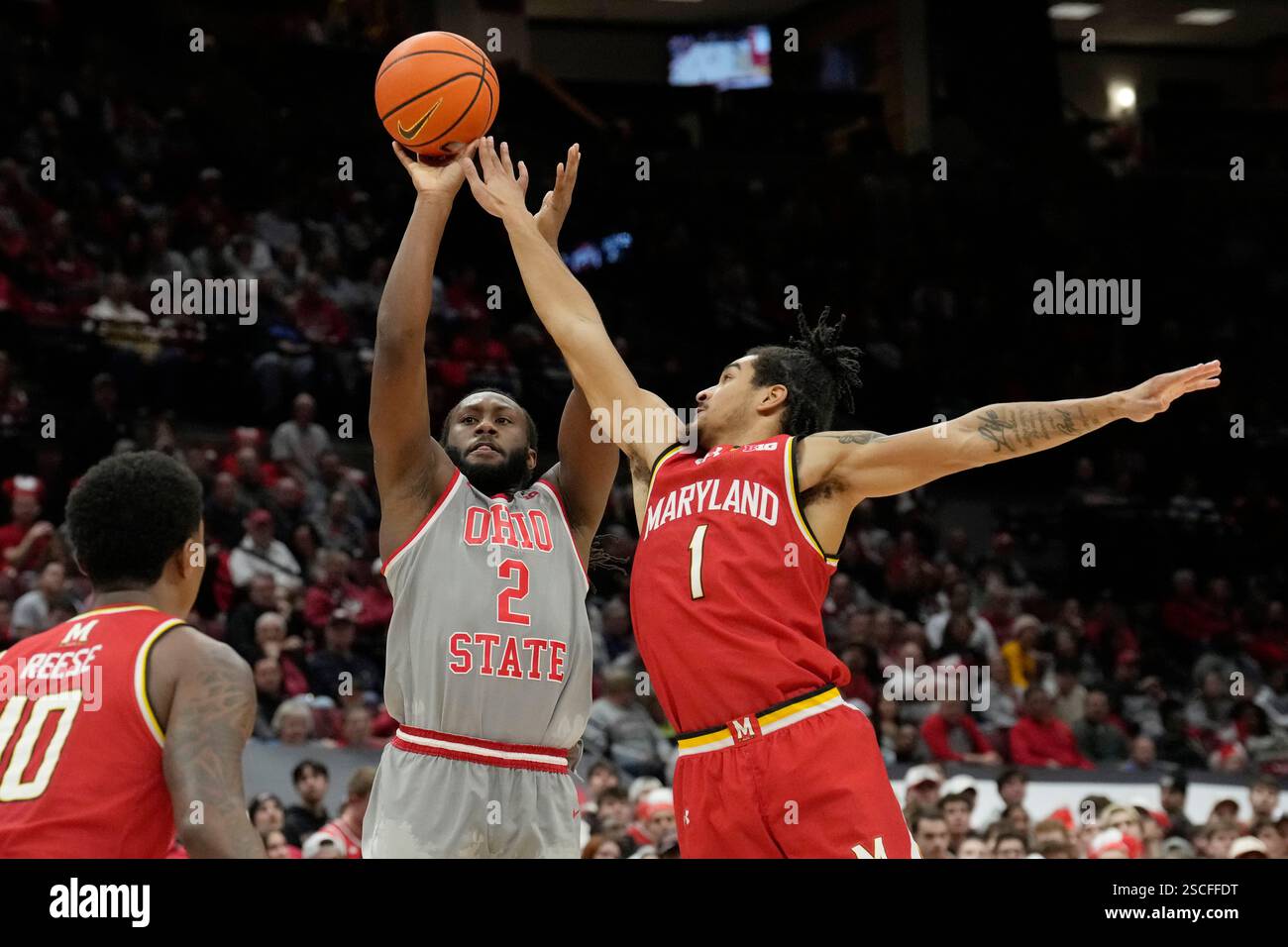 Ohio State guard Bruce Thornton (2) shoots between Maryland forward ...
