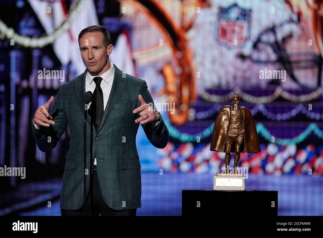 Former professional football quarterback, Drew Brees, presents the