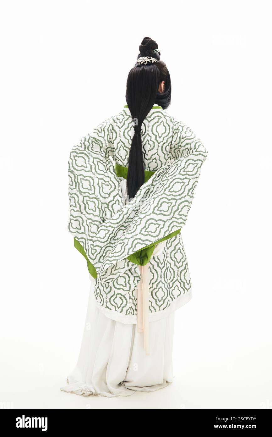 Teenage girl dressed in Chinese Han Dynasty costume on white background ...