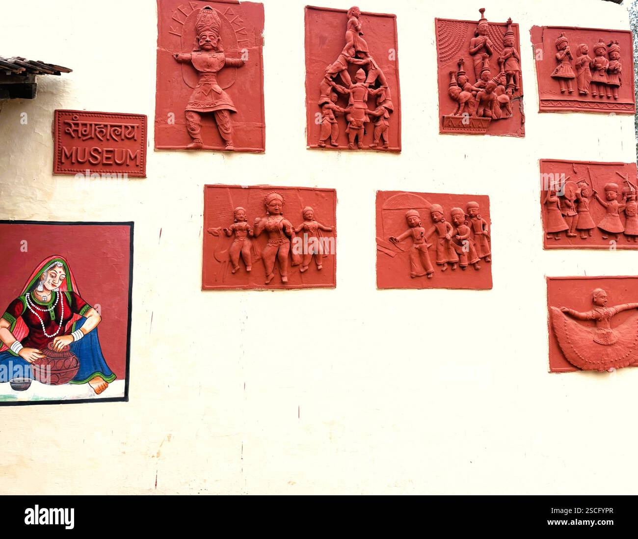 wall art different sculpture shows different tradition in India and thanking sculpture, wall art by Rajasthani artist - Smartphone Captured Stock Image
