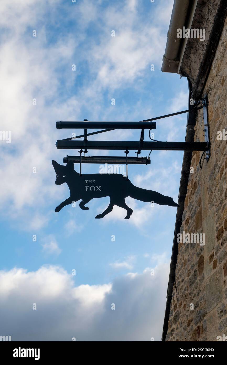 The Fox Inn sign. Lower Oddington, Cotswolds, Gloucestershire, England Stock Photo