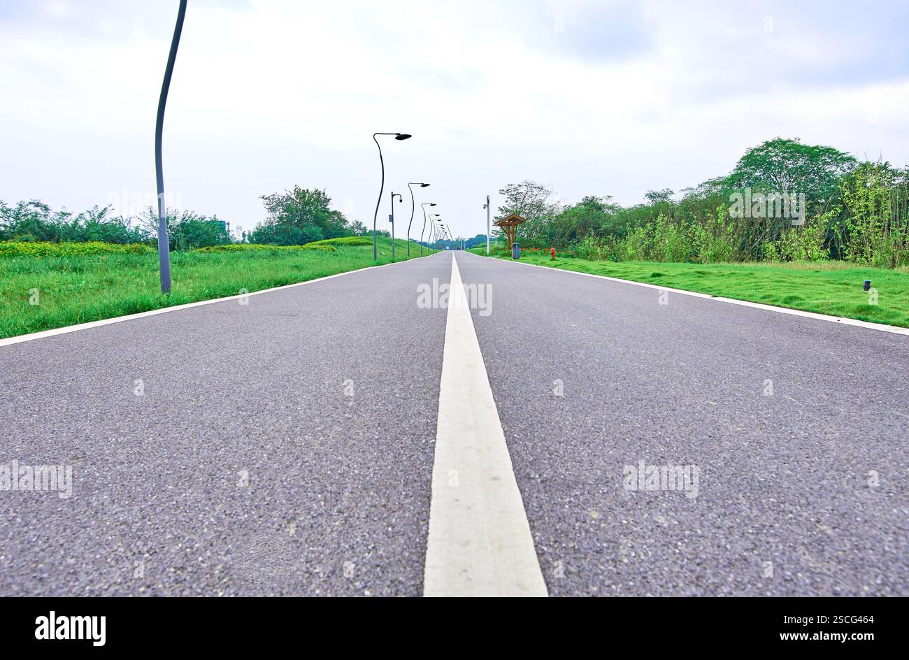 A straight road stretches into the distance Stock Photo - Alamy