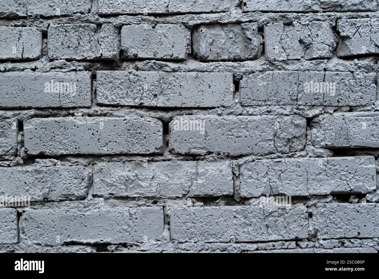 Grey bricked wall texture background wallpaper design desktop Stock Photo
