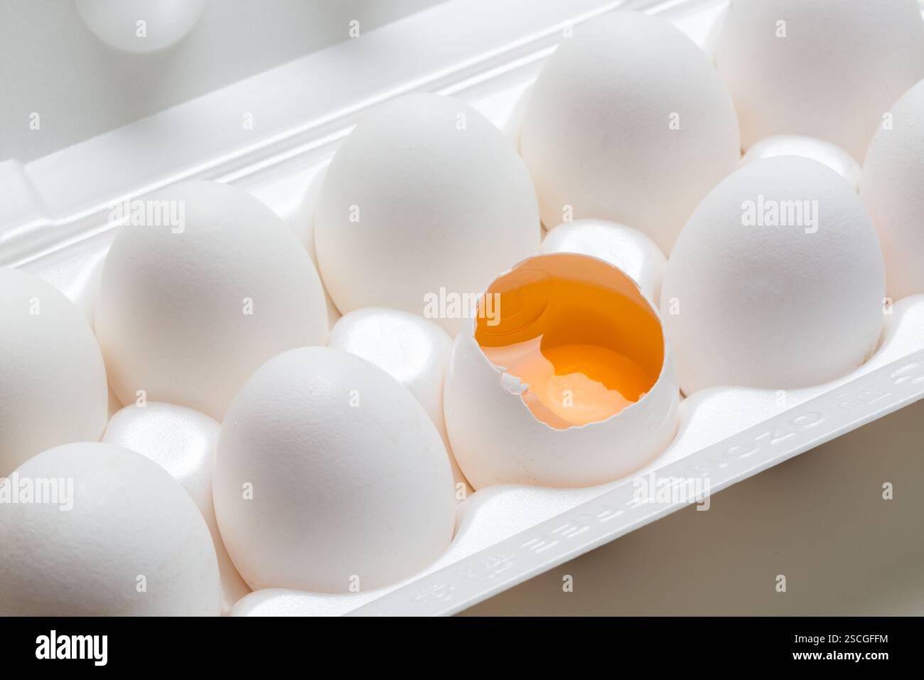 Chicken eggs in the cassette box on a white background Stock Photo - Alamy