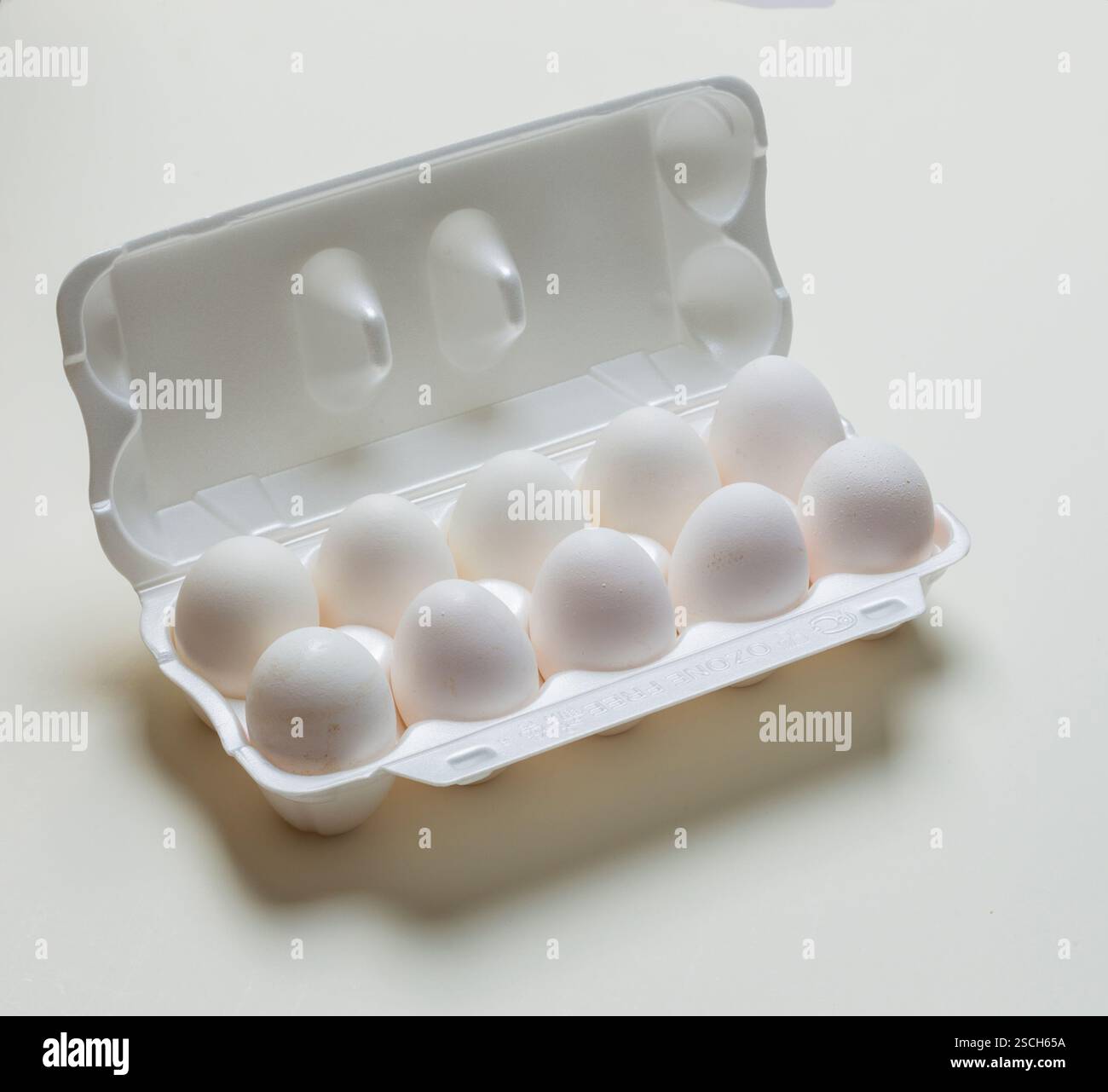 Chicken eggs in the cassette box on a white background Stock Photo - Alamy