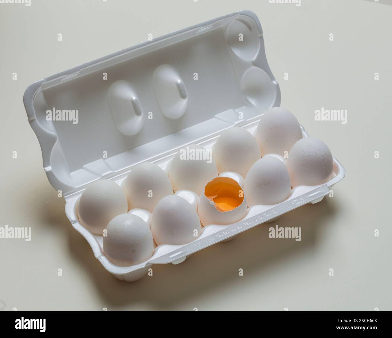 Chicken eggs in the cassette box on a white background Stock Photo - Alamy